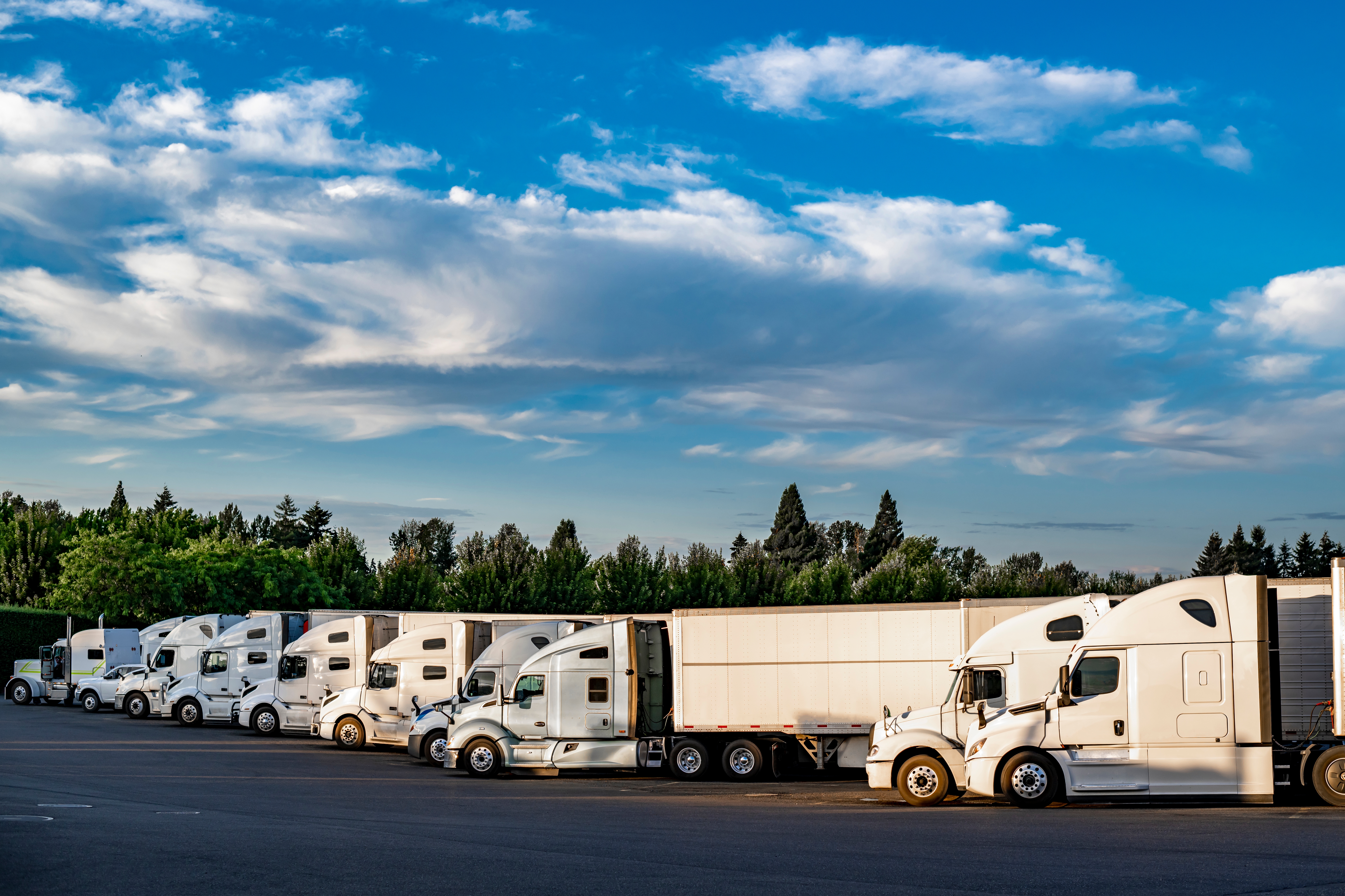 Industrial,Carriers,Big,Rig,Semi,Trucks,With,Semi,Trailers,Standing